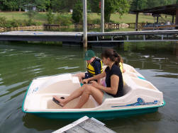 picture of kids in a paddle boat
